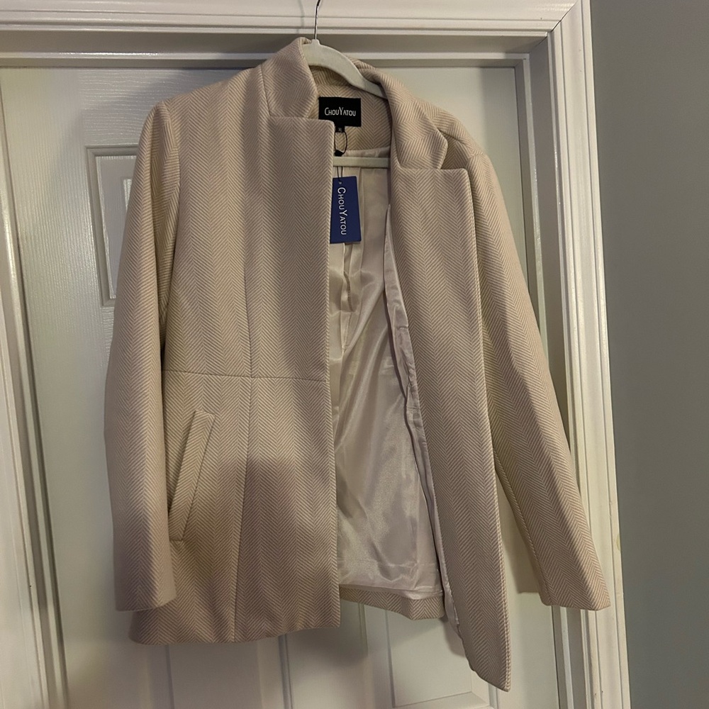Light pink/blush open blazer with pockets.